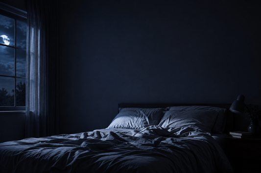 A dimly lit bedroom at night, symbolizing the disrupted sleep patterns discussed in this article on night terrors and parasomnias in adults.
